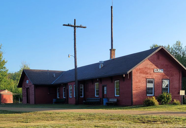 old train depot and trains